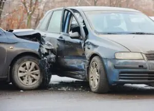 damaged vehicles after a side impact collision
