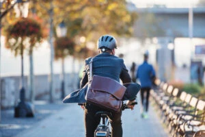 businessman commuter with electric bicycle