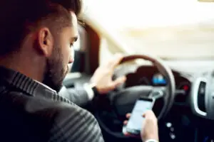 man texts and drives