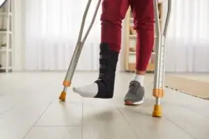 person on crutches