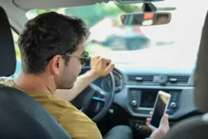 Texting-while-driving-accident-about-to-happen