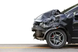 A side view of a car with damage to the front end.