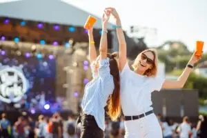 two women partying at a festival