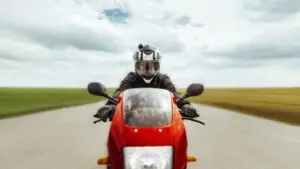 person on motorcycle driving at the camera