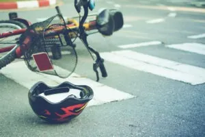 bike lying on road after pedestrian crash