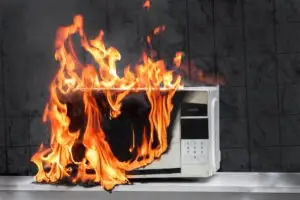 defective-microwave-house-product-appliance-on-fire
