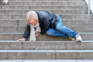 elderly-woman-falls-down-steps-outside