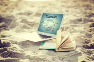 laptop-featuring-law-archive-on-beach