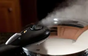 Pressure Cooker Releasing A Cloud Of Steam