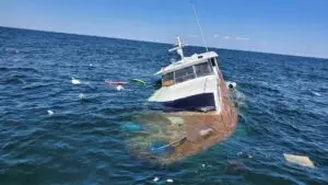 A boating accident lawyer helps file an insurance claim for a sunken boat.