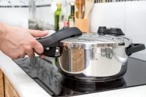 A woman injured while using a defective pressure cooker consults a product liability lawyer to take legal action against the at-fault party.