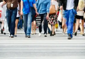 People walking on a crosswalk. Learn more about how long you have to file a pedestrian accident lawsuit.