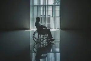 man-alone-in-a-wheelchair-in-a-nursing-home