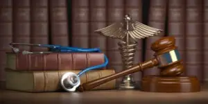 stethoscope-by-gavel-and-law-books