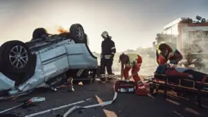 car-crash-with-paramedics-helping