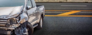 smashed-front-end-of-a-pickup-truck