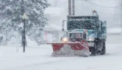 snow-plow-clearing-public-road