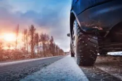 car-wheel-on-icy-road