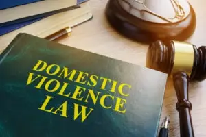 domestiv-violence-law-book-next-to-judge’s-gavel