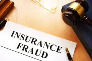 gavel-next-to-a-paper-that-reads-insurance-fraud-Michigan