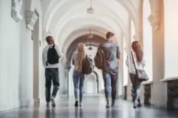 students-walking-on-a-college-campus