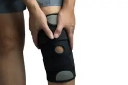 A man with a swollen knee. Find out what to do if you have leg swelling after a motorcycle accident.