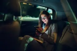 female-passenger-on-phone