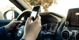 hand texting while driving