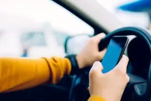 man caught texting while driving