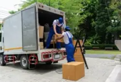movers loading a U-Haul truck