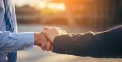 client and attorney shaking hands