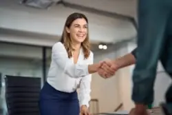 woman happy to shake hands
