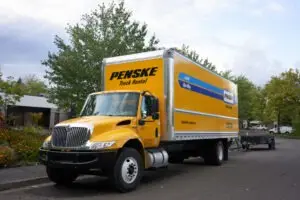 Penske truck parked on the side of the road