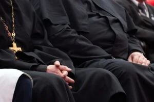 two clergy members wonder what is the Michigan priest scandal