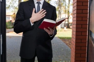 A Jehovah’s Witness at someone’s door. What are your rights in Jehovah’s Witness sexual abuse claims?