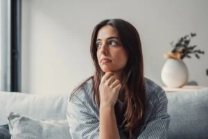 A woman looking off to her right after giving a victim impact statement.