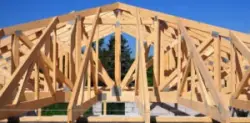 Unfinished,roofing,wooden,frame,house,construction,with,roof,beams,,trusses,