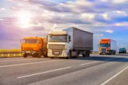 Trucks,goes,on,highway,in,evening,on,sunset
