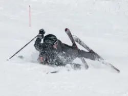 A skier hurt on a mountain slope and in need of the services of an experienced ski injury accident lawyer serving albuquerque