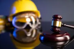 Construction hat and goggles with gavel