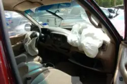 Interior car with deployed airbags