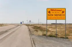 Welcome to new mexico sign and road